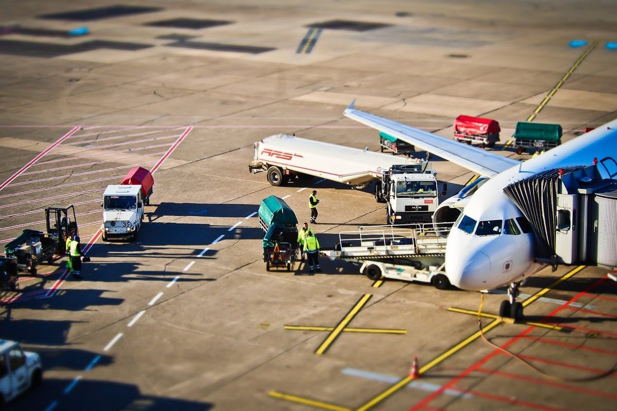 Freight aircraft being loaded at an airport apron